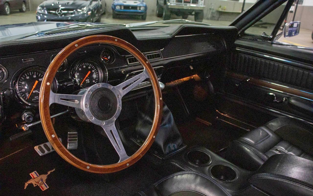 Steering wheel and cabin of the 1968 Ford Mustang